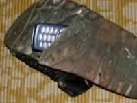 Diverse Stiri: Telefoane mobile si droguri pentru puscariasii romani