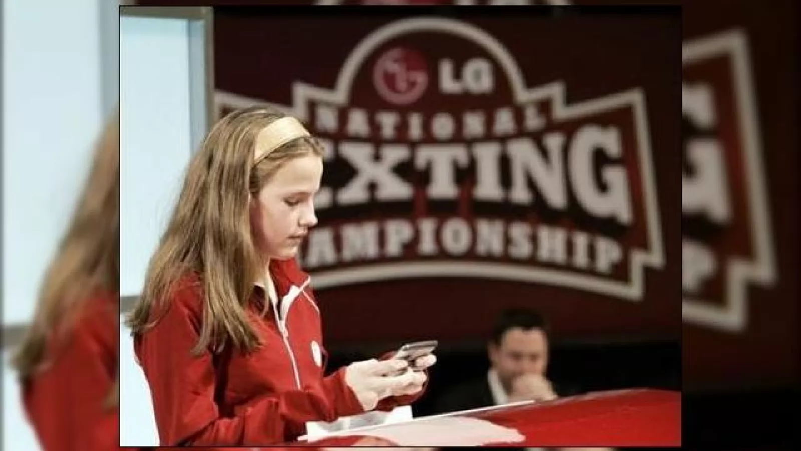 O fetita de 13 ani castiga campionatul american de tastat SMS-uri!