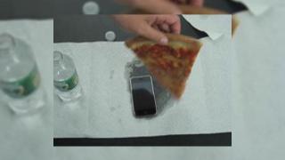 Alta tentativa de distrugere a iPhone... acum cu pizza!