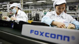 Foxconn le oferă angajaților din China bani pentru a încheia conflictele violente începute recent