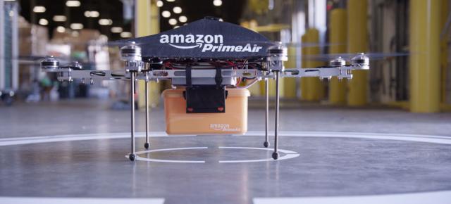 Amazon va face livrările de colete În 30 de minute folosind drone cu elice (Video)