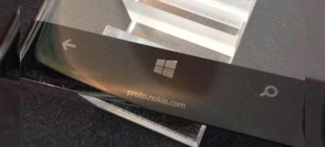 Un prototip Nokia cu ecran cu margini curbate apare într-o bizară imagine teaser; Nokia sau Lumia?