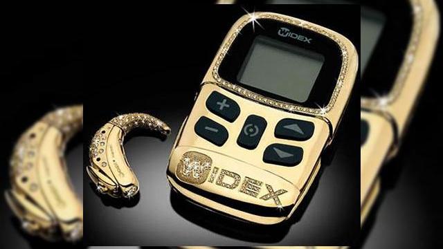 <b>Aparatul auditiv de aur - stil oferit disabilitatii</b>Nu, in imaginea de mai jos nu avem de-a face cu noul iPod modificat in China, ci cu un aparat auditiv destul de stralucitor si mare ca dimensiuni. Aparatul este dotat cu o telecomanda wireless, iar daca pana acum ne imaginam ca oamenii cu probleme de auz...