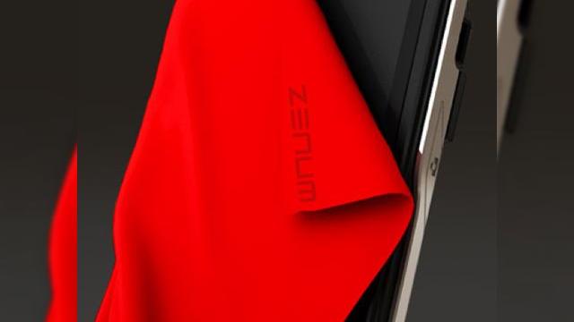 <b>Noua imagine teaser Zenum indica un nou terminal mobil</b>Compania elvetiana Zenum a trimis celor de la Engadget Mobile o "felicitare" neobisnuita de sarbatori, sub forma imaginii de mai jos, care reprezinta un terminal misterios. Handsetul este infasurat intr-o tesatura rosie, permitand cititorilor sa vada doar...