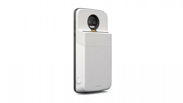 <b>Noul modul Moto Polaroid Insta-Share este o imprimantă foto portabilă pentru Moto Z-uri; Disponibil de pe 17 noiembrie</b>Numărul de module Motorola Moto Mods este pe cale să primească un nou membru în perioada următoare, unul ce va sosi sub forma lui Polaroid Insta Share. Este vorba despre un accesoriu ce se atașează în spatele telefonului