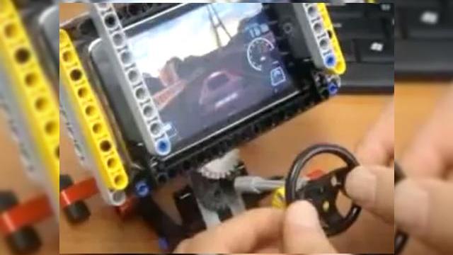 <b>Volanul pentru iPhone, cand LEGO a intalnit NFS (Video)</b>Daca sunteti pasionati de jocurile de curse, cu accentul pe NFS si sunteti posesor de iPhone, iata cum va puteti face viata mai usoara, in ce priveste sistemul de control al jocurilor: &nbsp; &nbsp; Solutia vine prin intermediul unui volan de curse...