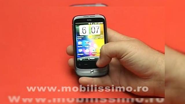 <b>HTC Wildfire, un Desire mai ieftin analizat de Mobilissimo.ro (recenzie video)</b>L-ati vazut cu siguranta pe HTC Wildfire in spoturile TV din ultima vreme, astfel ca ne-am gandit sa aruncam o privire asupra acestui terminal. A rezultat recenzia de mai jos si ampla galerie de la finalul articolului, in care veti vedea handsetul intors...