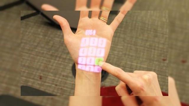 <b>Asta e viitorul tastaturilor - suprafața de input virtuală și interactivă, sub formă de proiecție (Video)</b>Am văzut telefoane concept bazate pe o interfață proiectată pe un perete sau pe o masă, cu care utilizatorul interacționa direct și mi s-a părut o idee futuristă. Bine ați venit în viitor în cazul ăsta, deoarece OmniTouch a pus în aplicare...