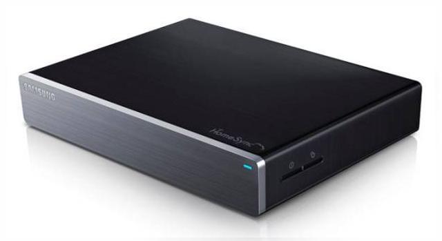 <b>Samsung HomeSync - Media Streamer cu 1 TB spațiu de stocare analizat Într-un video hands-on oficial (Video)</b>Soluțiile pentru consum media acasă au devenit din ce în ce mai atractive pentru utilizatori și în aceste condiții Samsung nu a ratat oportunitatea de a lansa propria soluție bazată pe Android și ce oferă 1 TB spațiu de stocare. O analiză...