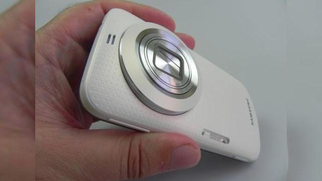<b>Samsung Galaxy K Zoom Review: stabilizare optică excelentă, calitate la zoom foarte bună, Într-un ambalaj neimpresionant (Video)</b>Samsung Galaxy K Zoom este cel mai nou cameraphone de la Samsung, cu carcasa de 20 MP și zoom optic 10X. Cunoscut și că Galaxy S5 Zoom, acest produs a fost anunțat în aprilie și lansat în iunie. Produsul costă 1879 lei, iar acest cameraphone este...